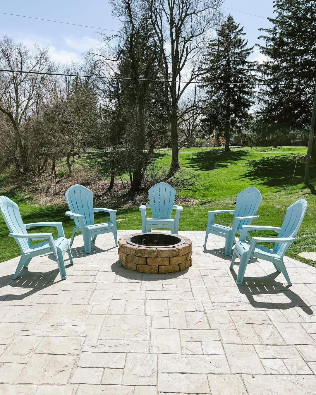 Pale Blue Adirondack Chairs Offer Relaxed Seating