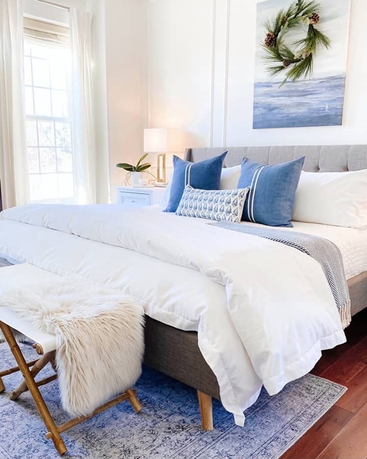 Blue and White Pillows Layer for a Cozy Bed