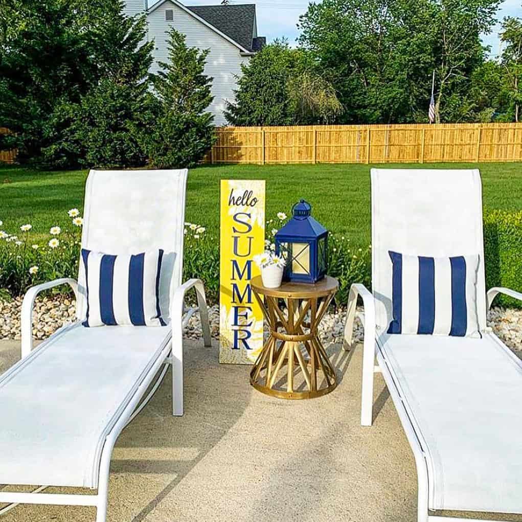 Blue and White Pillows Accent Outdoor Chaise Lounges