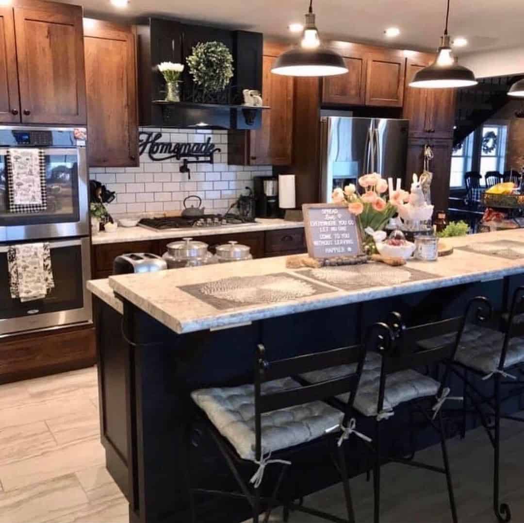 Warm Wood Cabinets Frame a Classic Subway Tile Backsplash