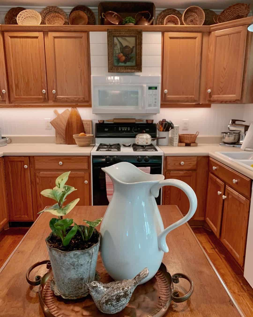 Warm Wood Cabinets With Round White Knobs