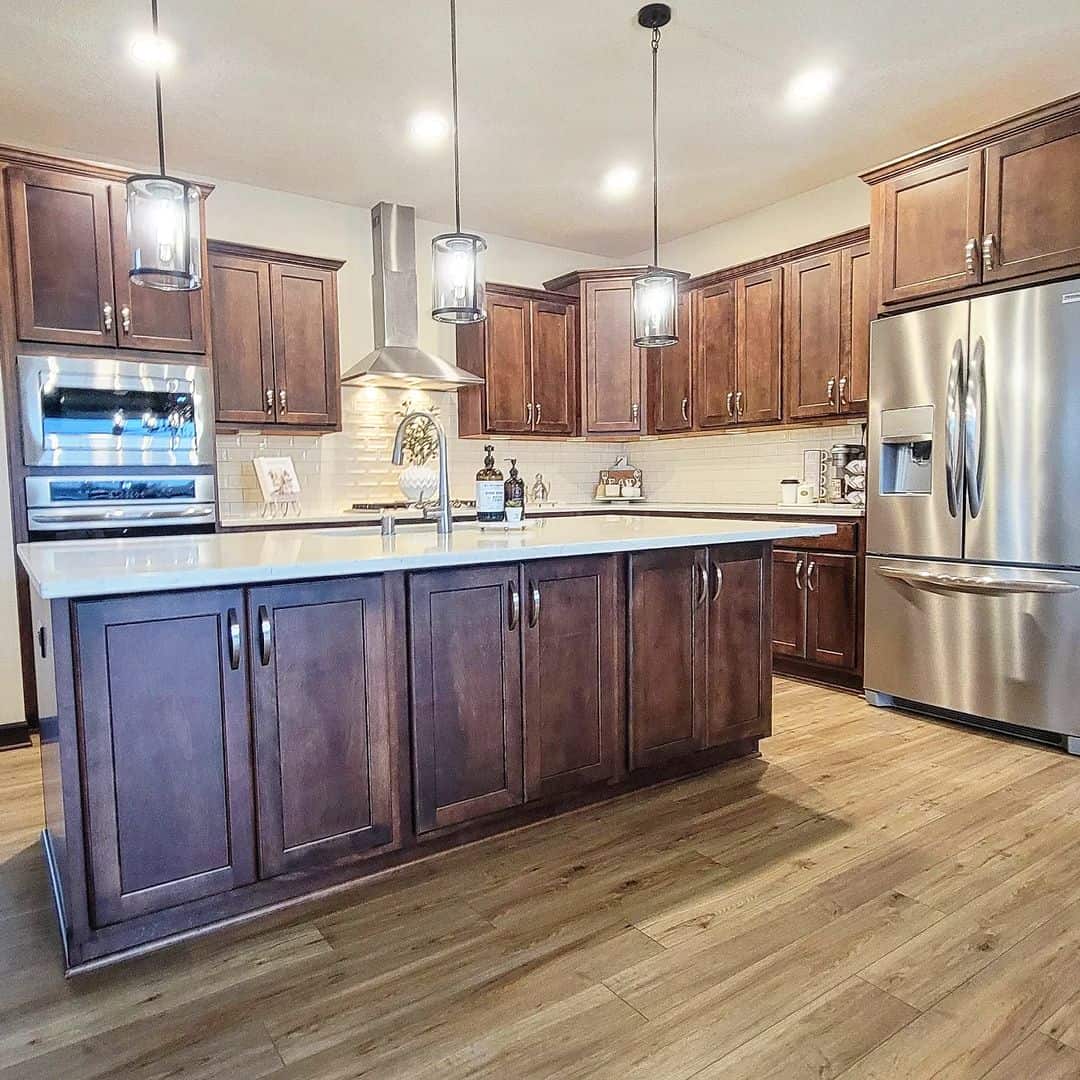 Dark Wood Cabinets With Simple Silver Bar Pulls