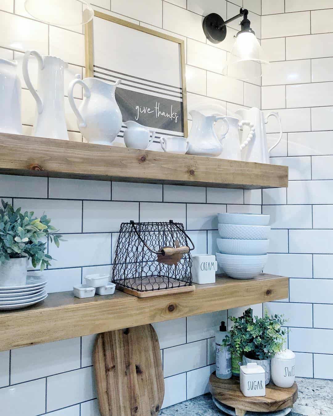 Wood Shelves Display a Mix of White Pitchers and Farmhouse Accents