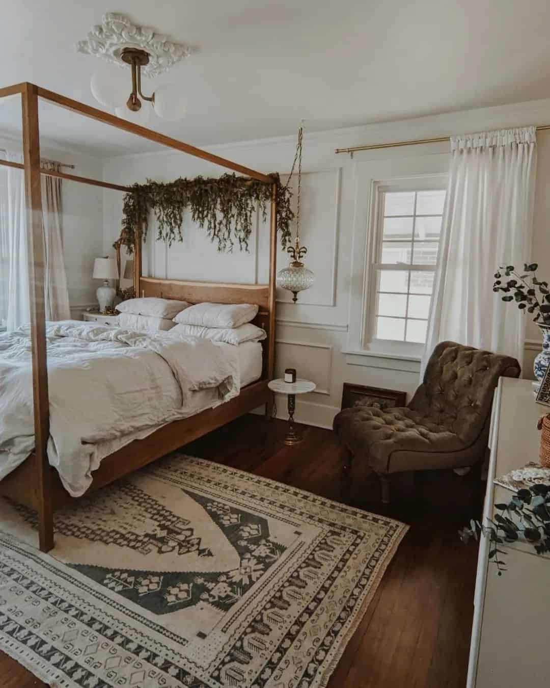 Greenery Draped Over a Four-Poster Bed Adds Natural Texture