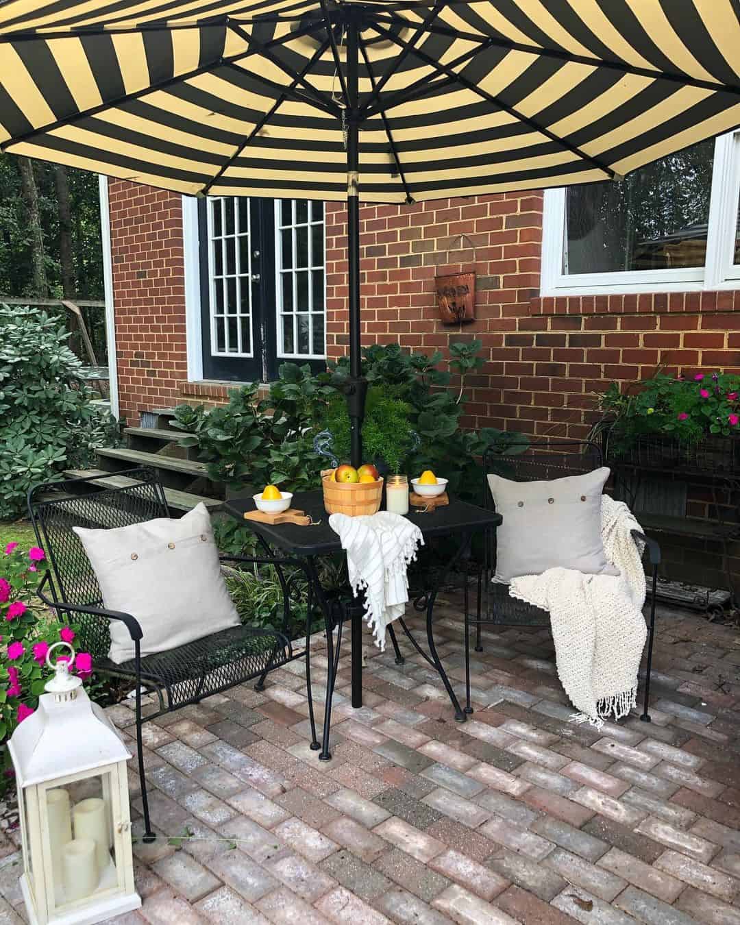 Black and White Striped Umbrella Creates a Bold Patio Statement