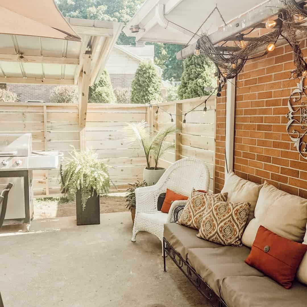 Twisted Grapevine Garland Adds Rustic Charm Above Outdoor Seating