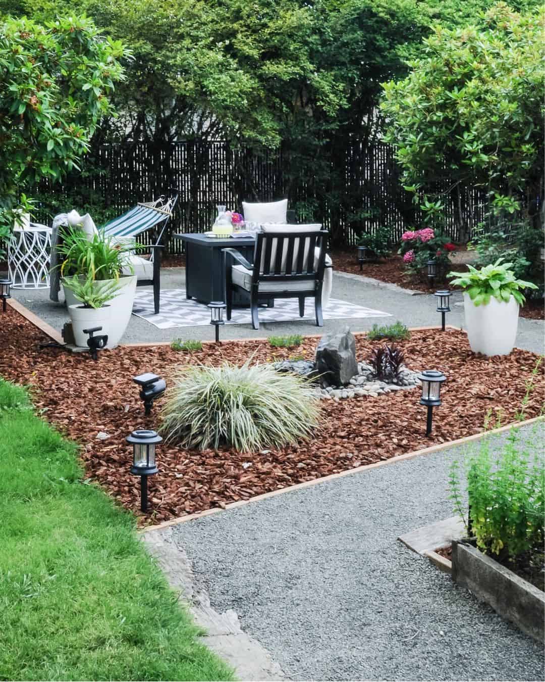 Center Your Seating with a Black Metal Fire Pit