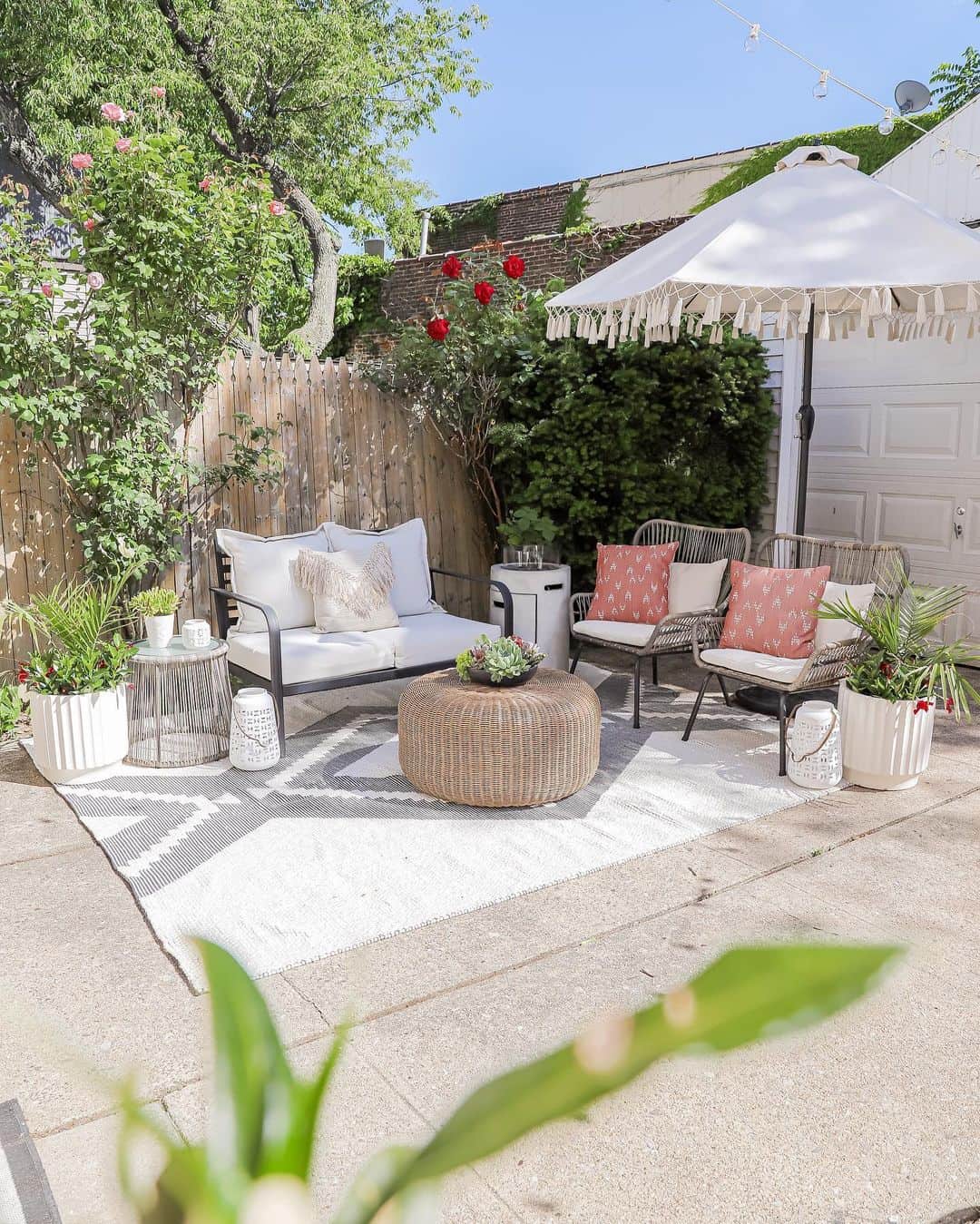 Ground Your Seating Area with a Rattan Ottoman
