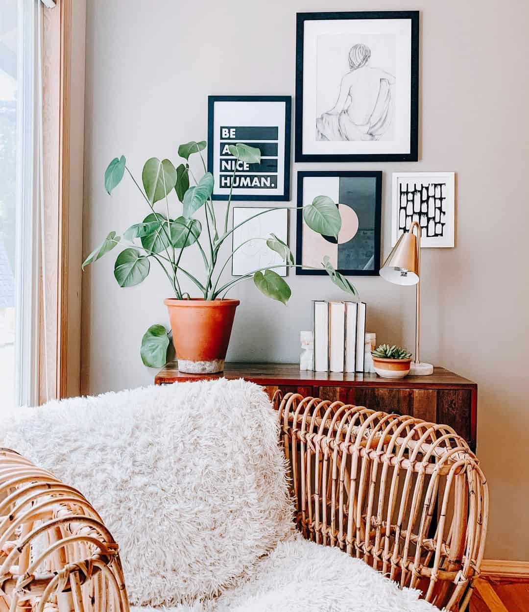 Layer art and plants for a gallery wall