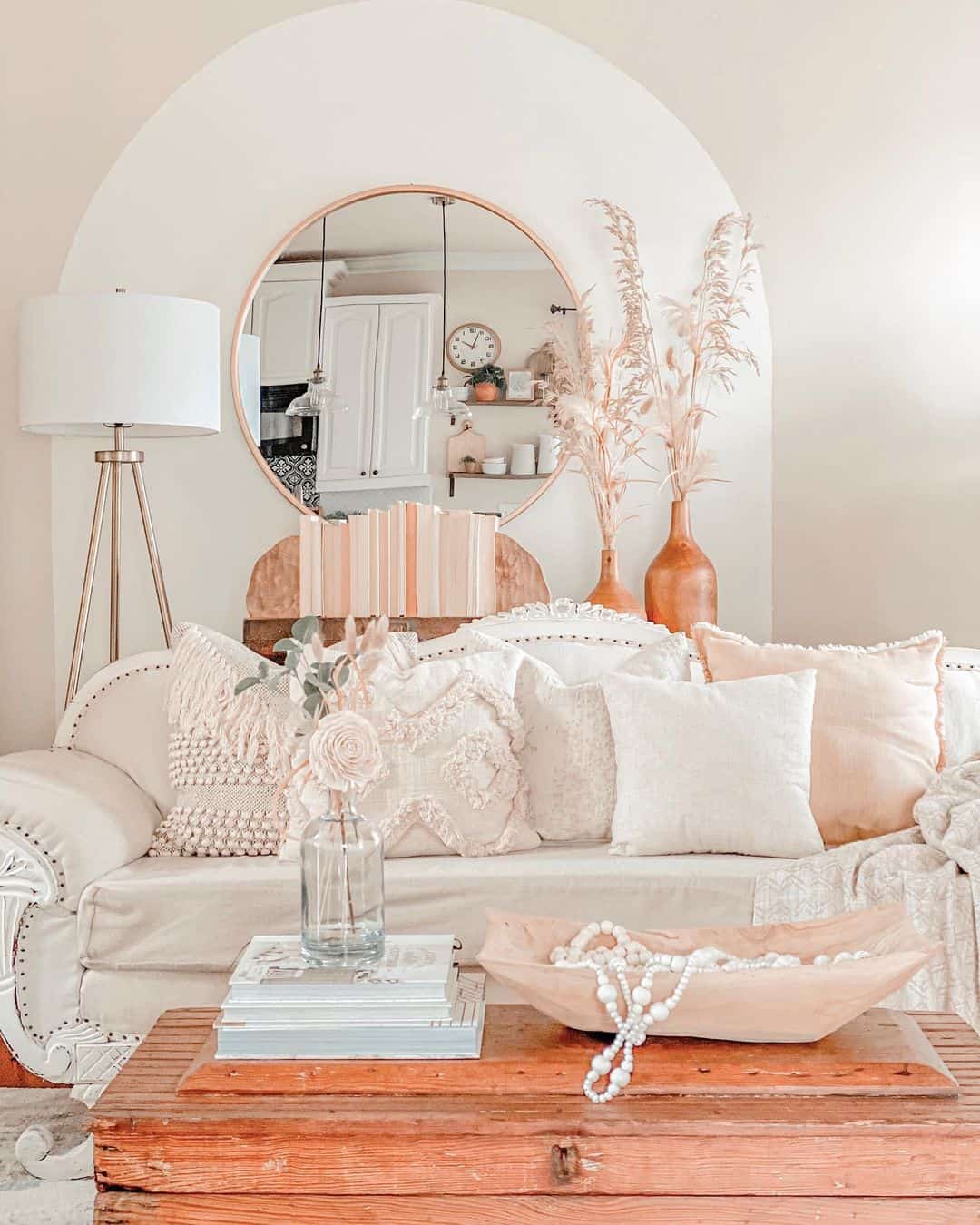 Layer pillows with varied textures for a plush sofa