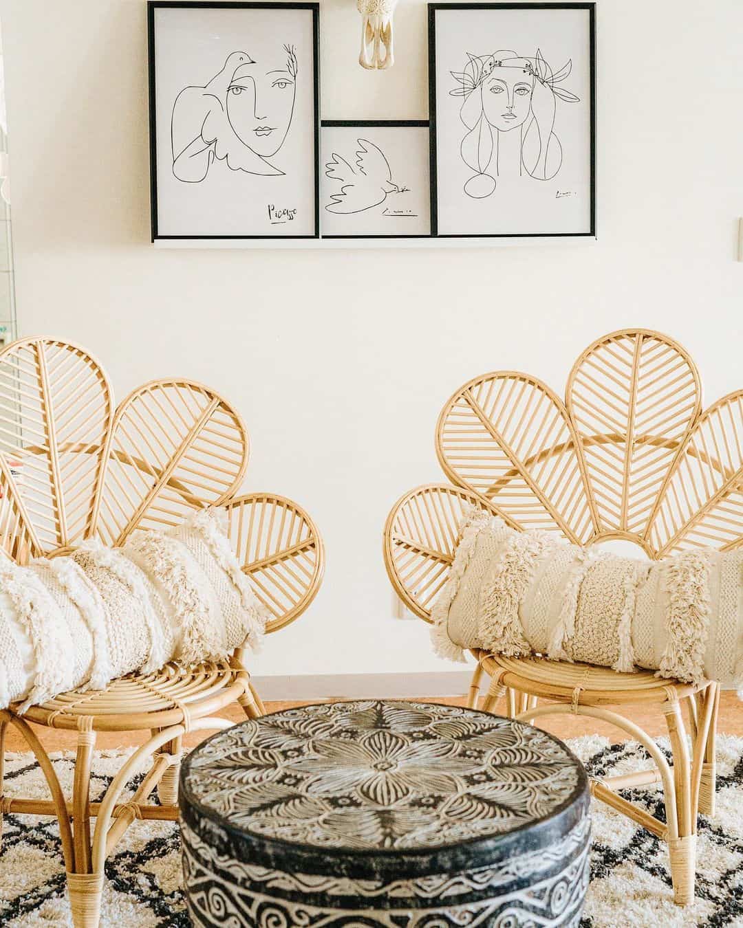 Rattan peacock chairs with textured lumbar pillows create a cozy seating nook