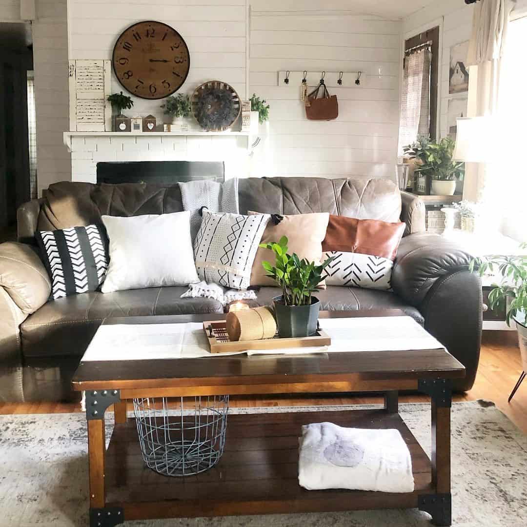 Layered Throw Pillows Add Boho Texture to Leather Sofa