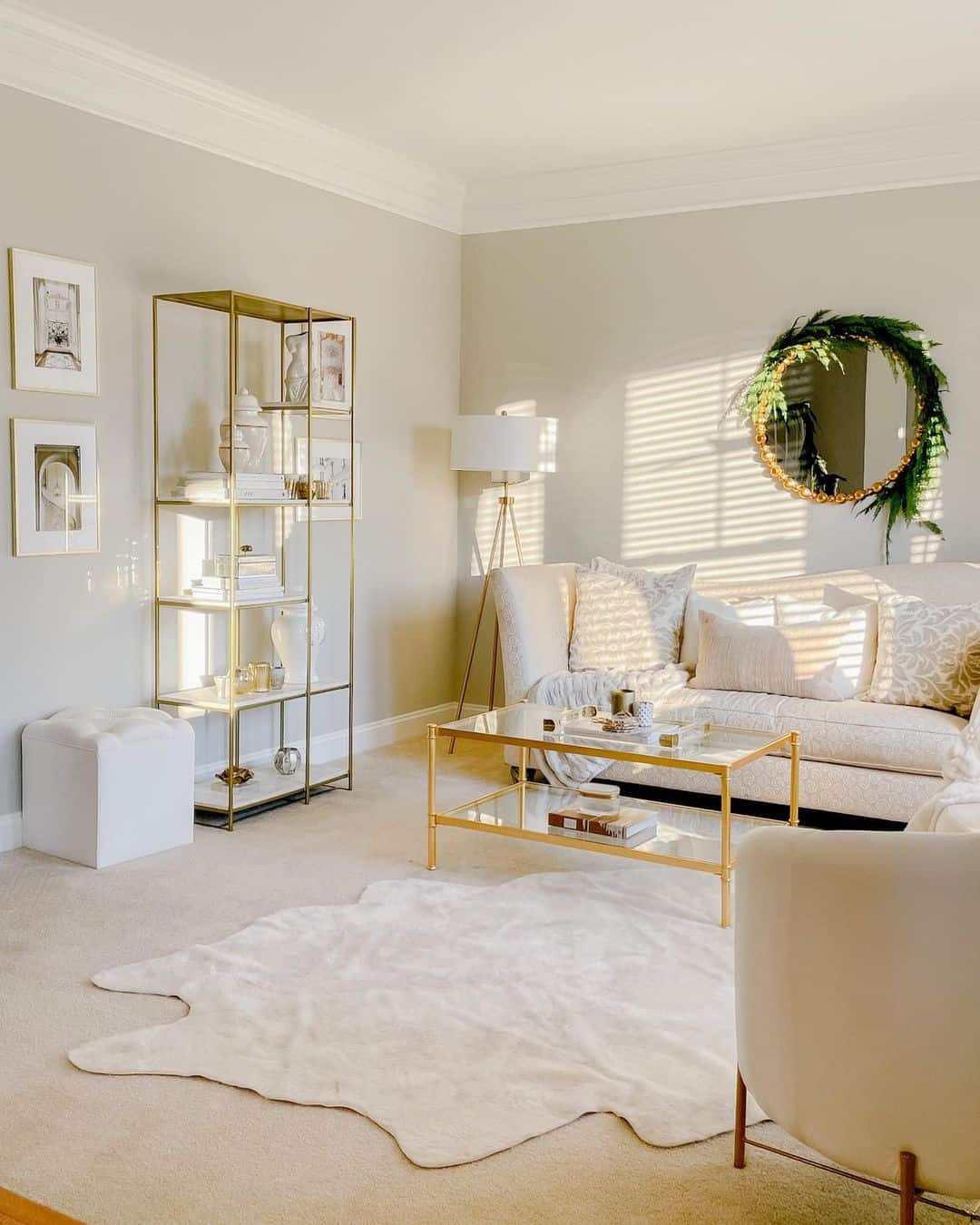 Gold-Framed Mirror with Greenery for a Natural Accent