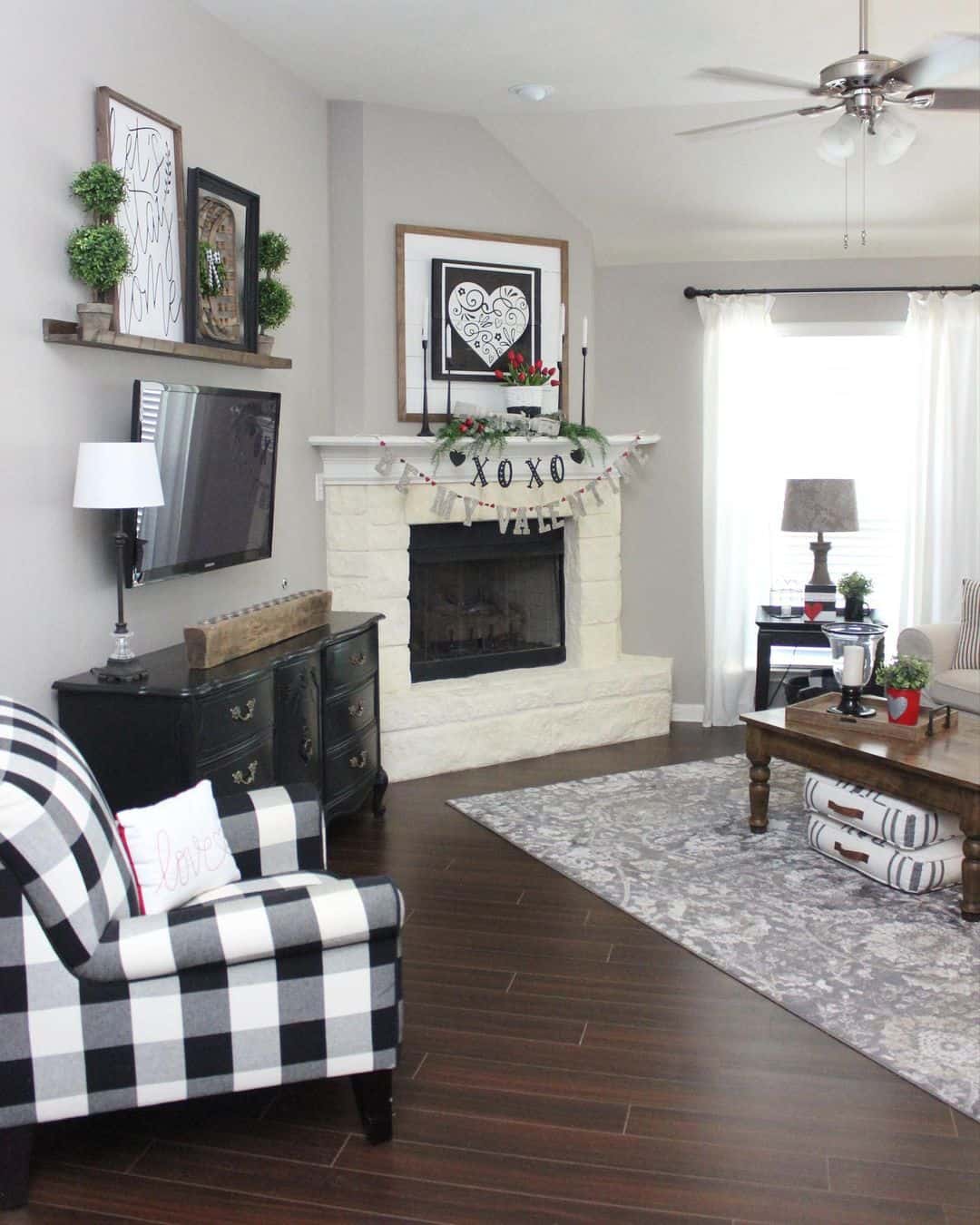 Layered Artwork and Greenery on Floating Shelves