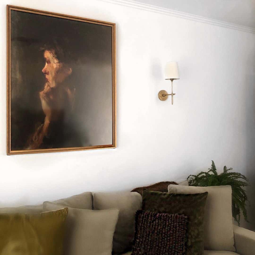 Spotlight Art Above the Sofa with a Single Sconce