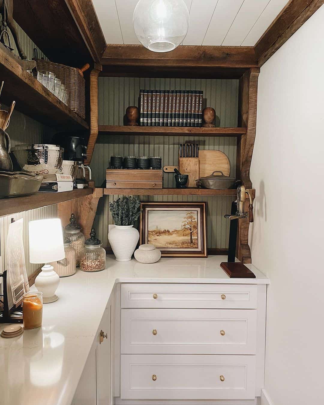 Vintage Landscape Art Adds a Cozy Focal Point to Countertops