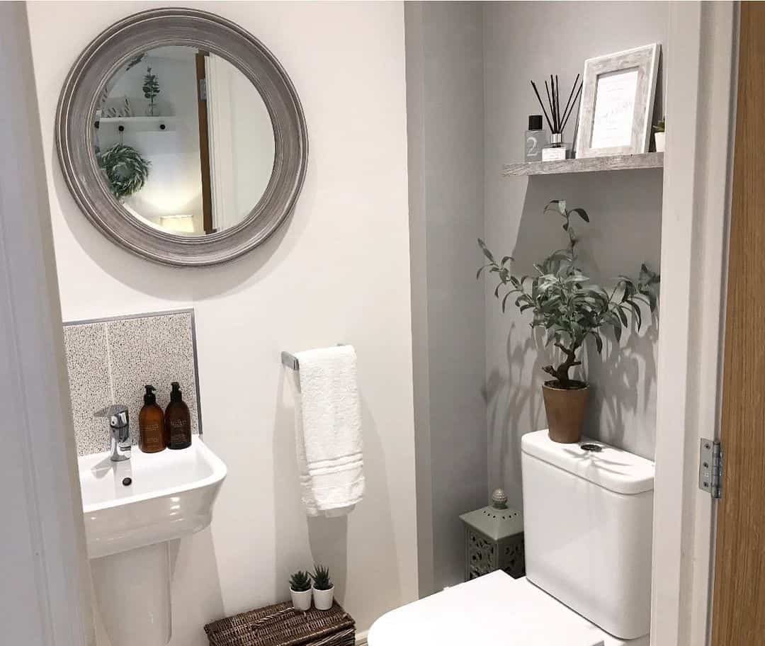 Bring Natural Charm with a Potted Plant and Framed Art