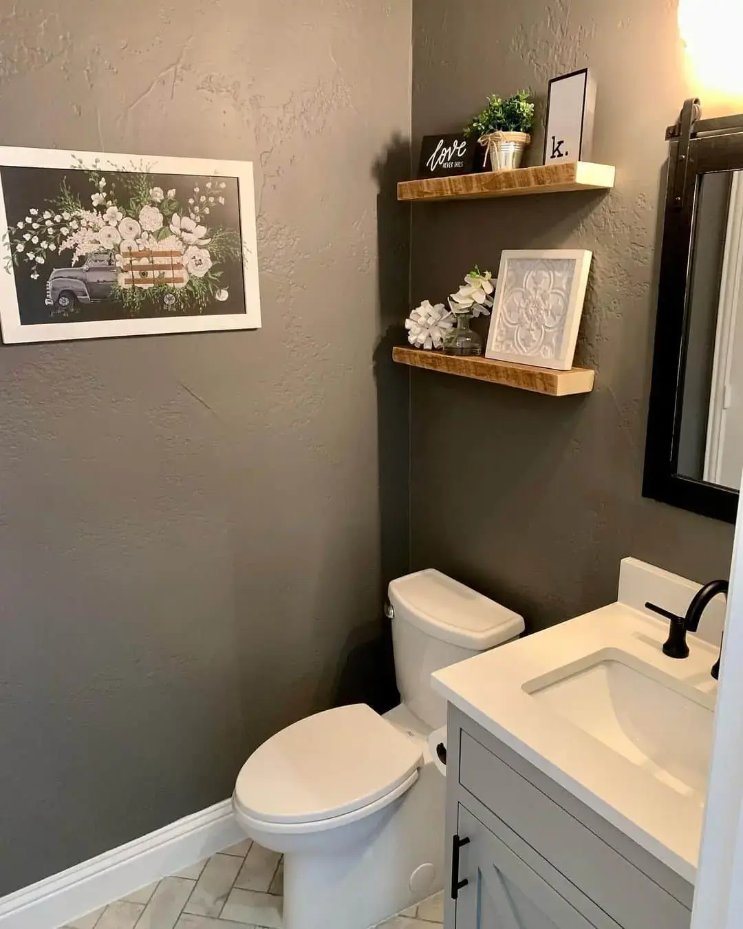 Rustic Shelves Hold a Small Plant and Decorative Art