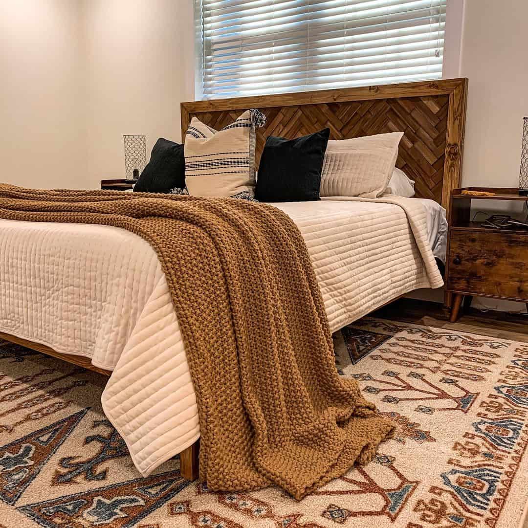 Herringbone Wood Headboard Adds Rustic Texture Above Bed