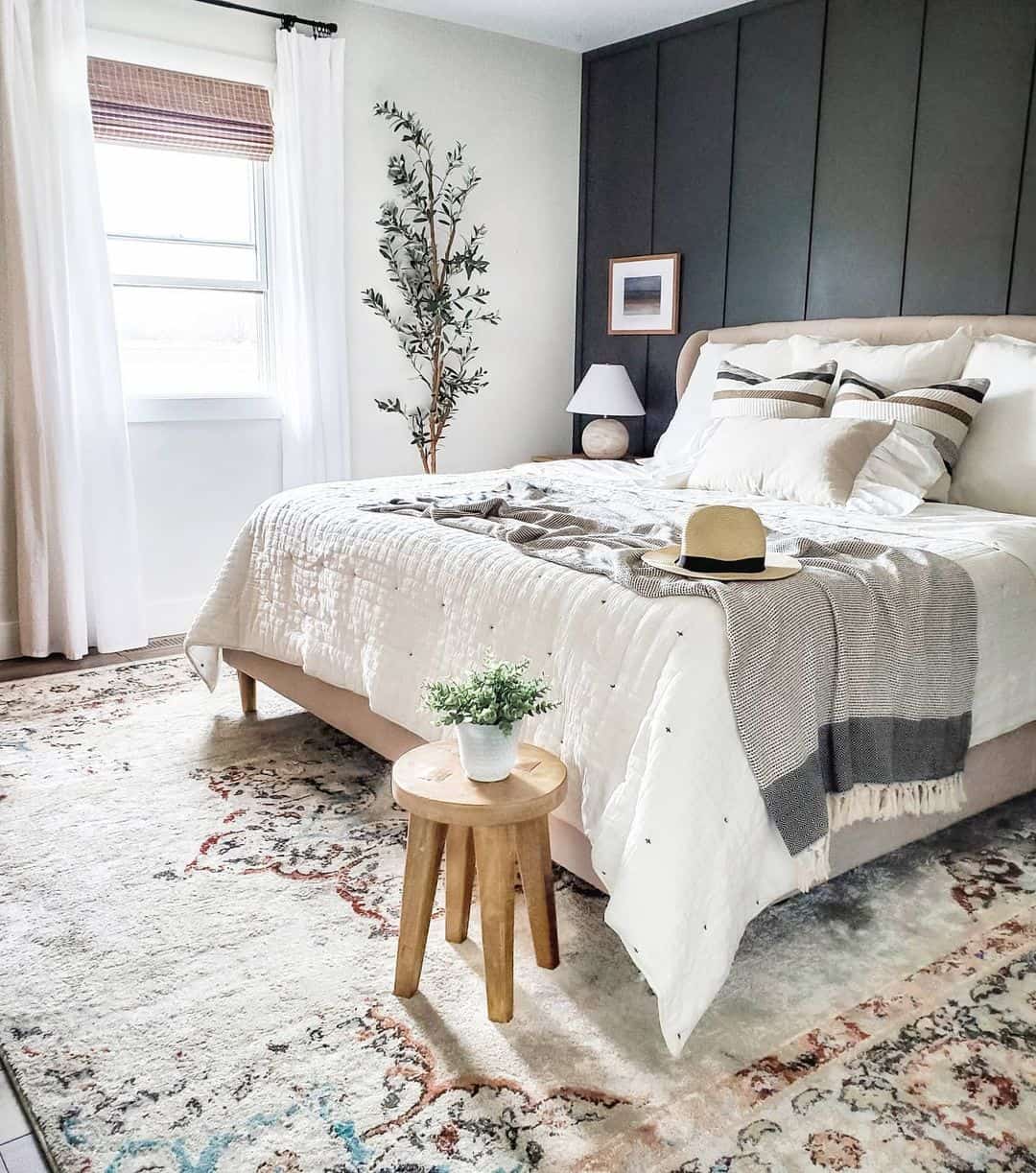 Dark Vertical Paneling Creates a Dramatic Bedroom Accent