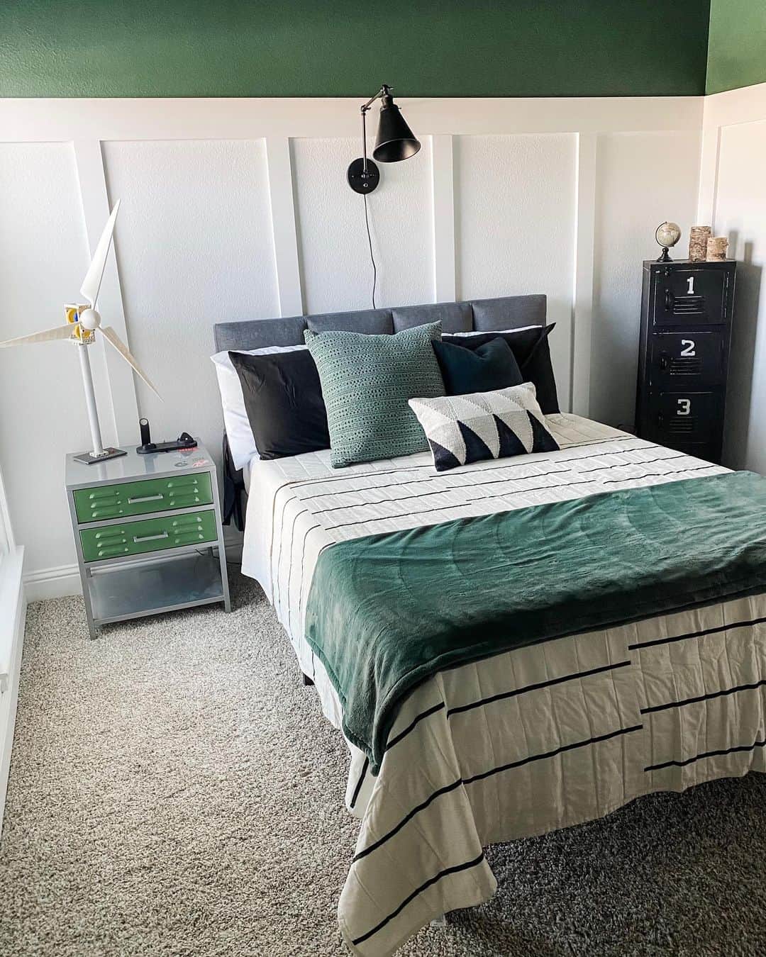 Board and Batten Walls Frame a Graphic Striped Bedding