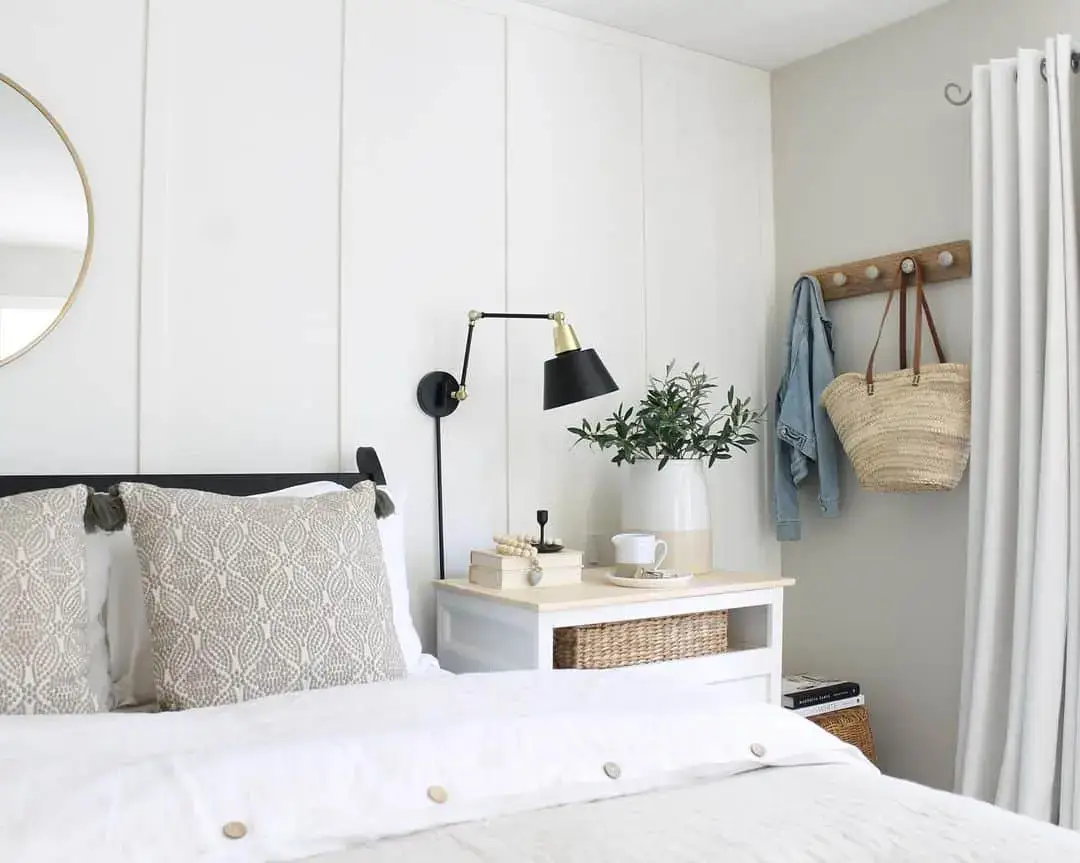 Board and Batten Walls With a Black Swing-Arm Lamp