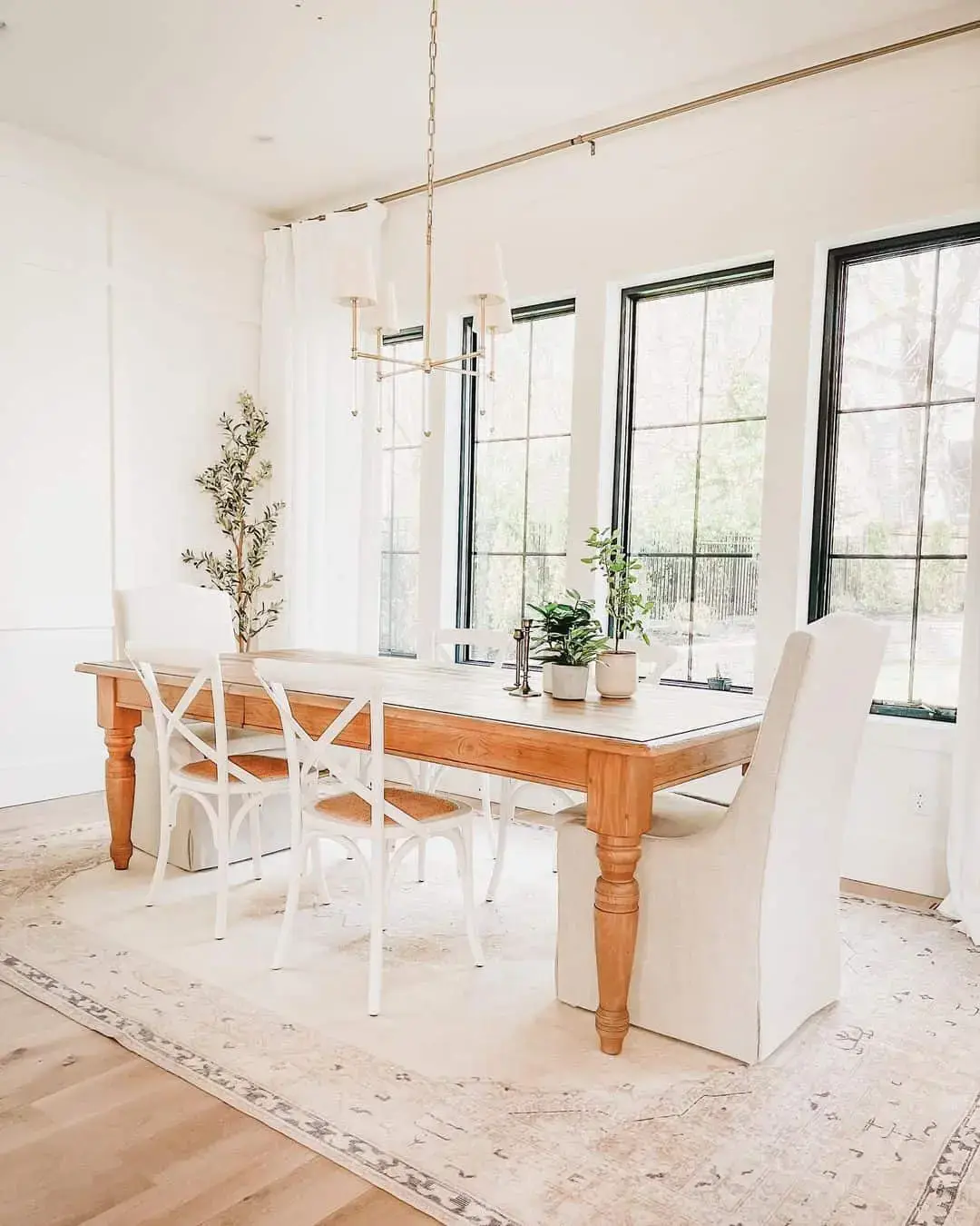 Natural Wood Dining Table with Tapered Legs and Slipcovered Chairs