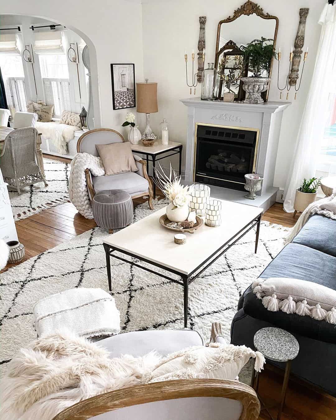 Frame Your Fireplace with an Ornate Mirror and Sconces