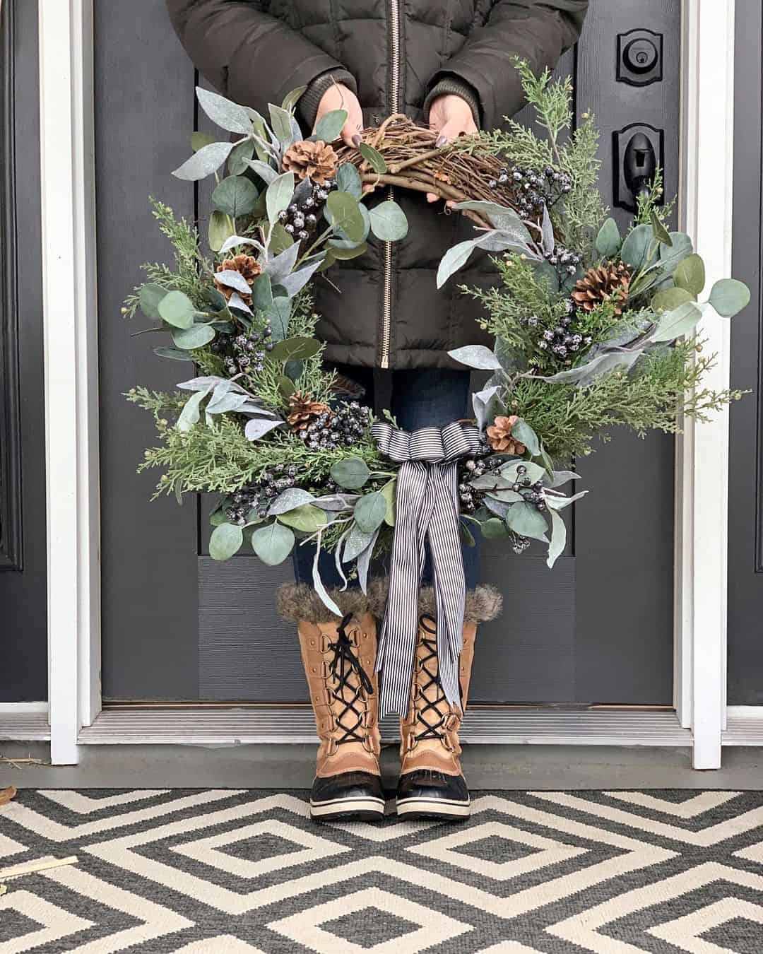 Winter Greenery Wreath with Pinecones and Striped Ribbon