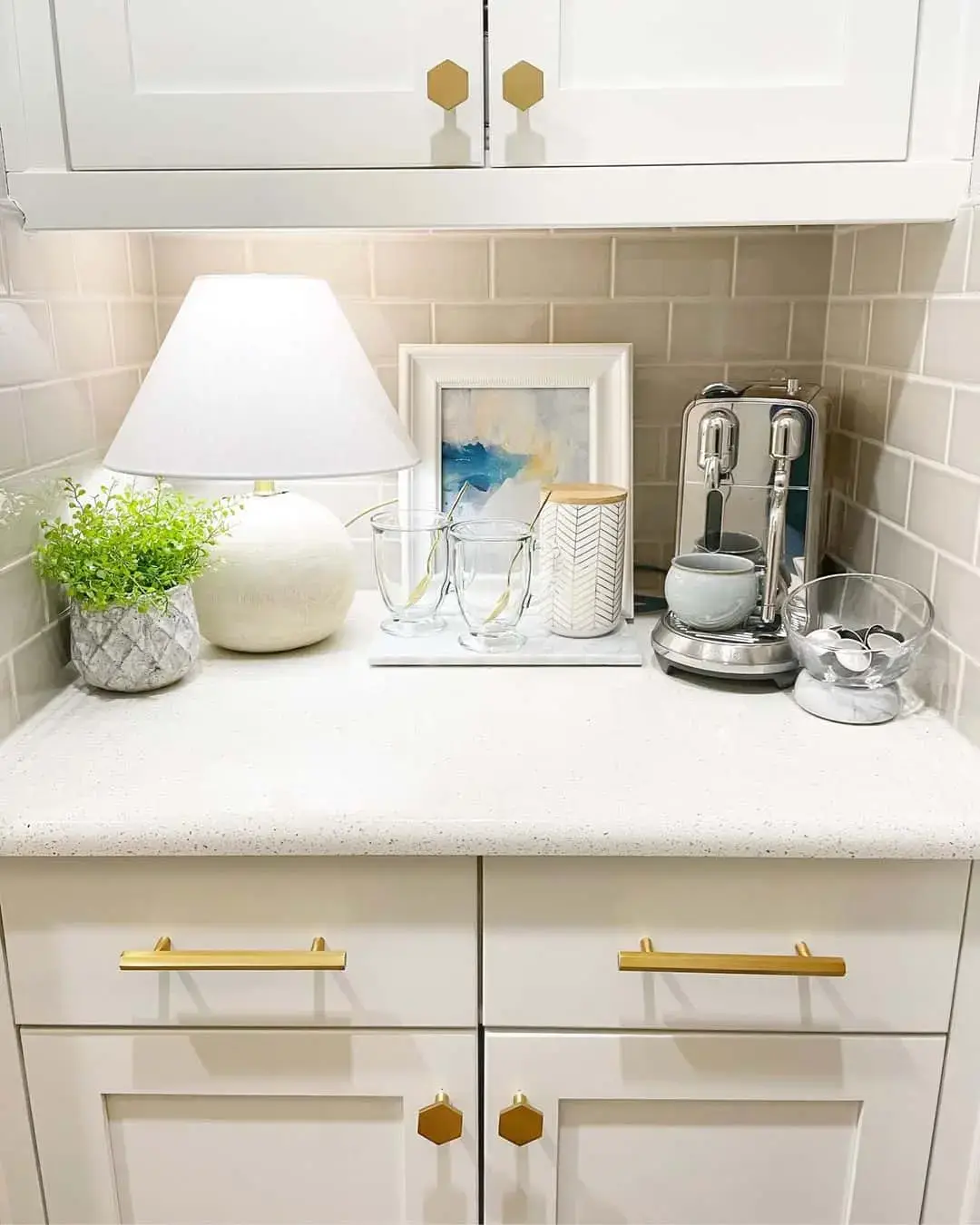 White Lamp and Artwork Frame Add Softness to Coffee Station