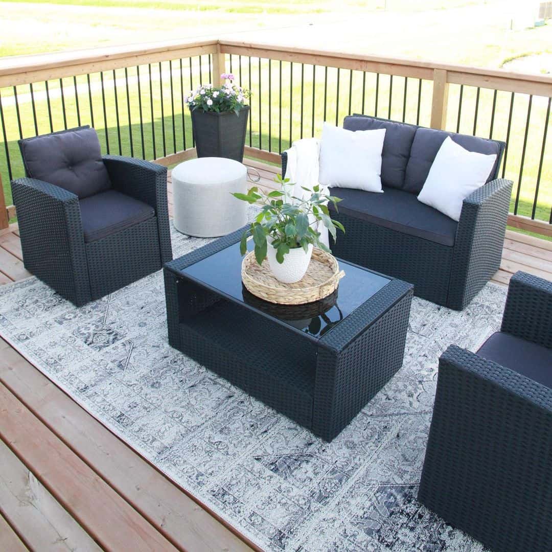 Woven Tray Holds a Potted Plant for a Natural Coffee Table Accent