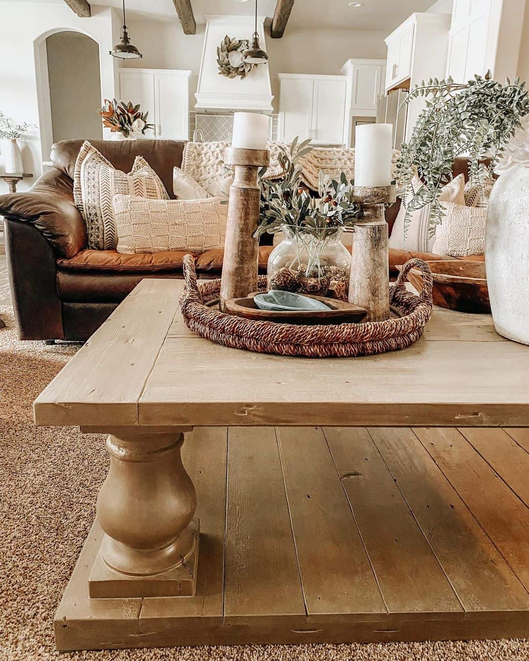 Twisted Rope Tray Holds Tall Wooden Candlesticks
