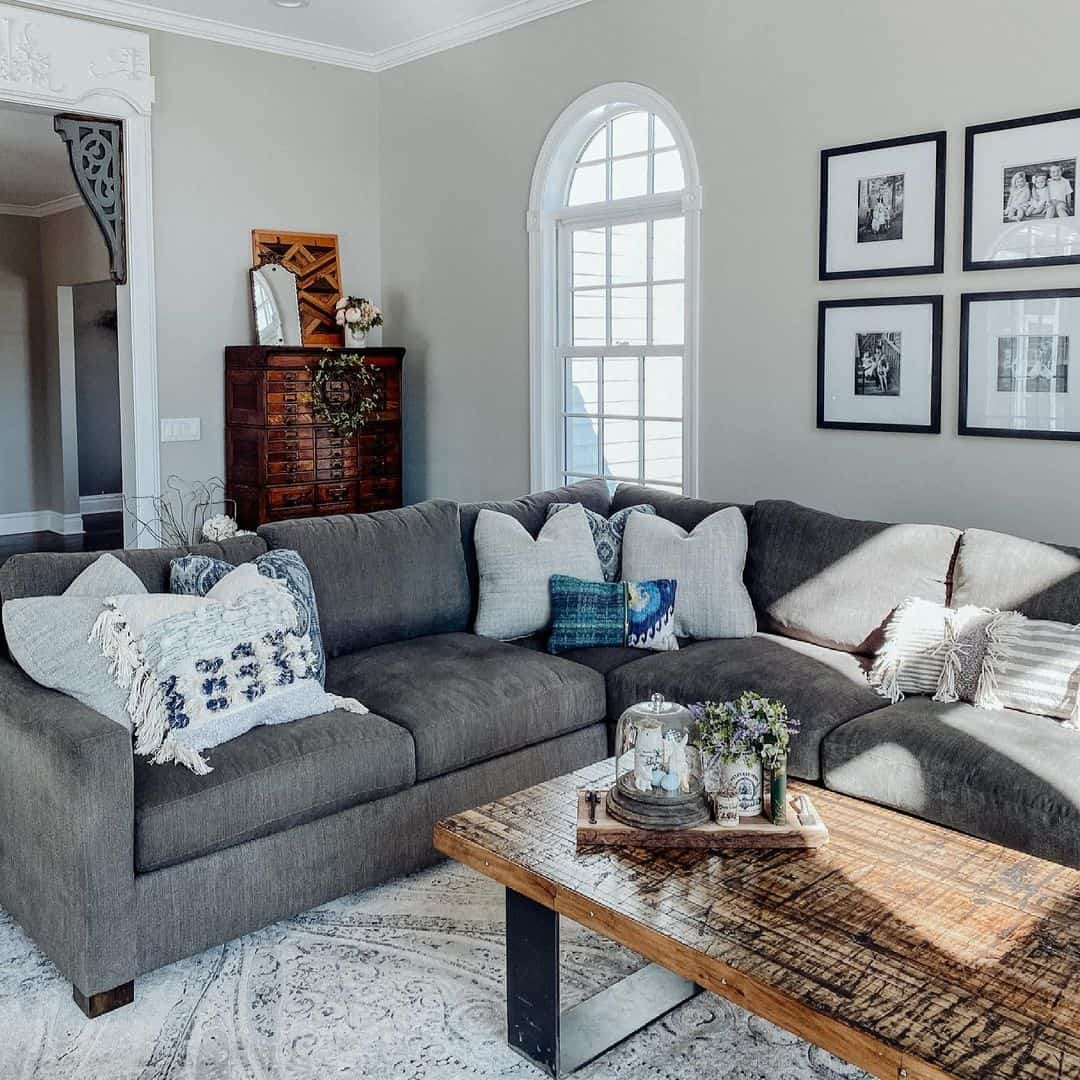 Layered Throw Pillows Add Cozy Texture to Your Dark Grey Sectional