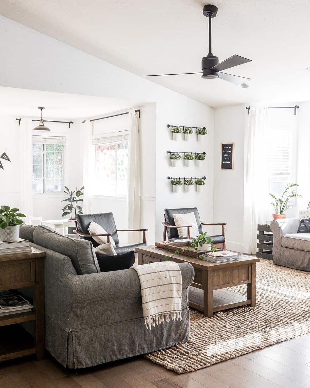 Wall-Mounted Planters Add Vertical Greenery to White Walls
