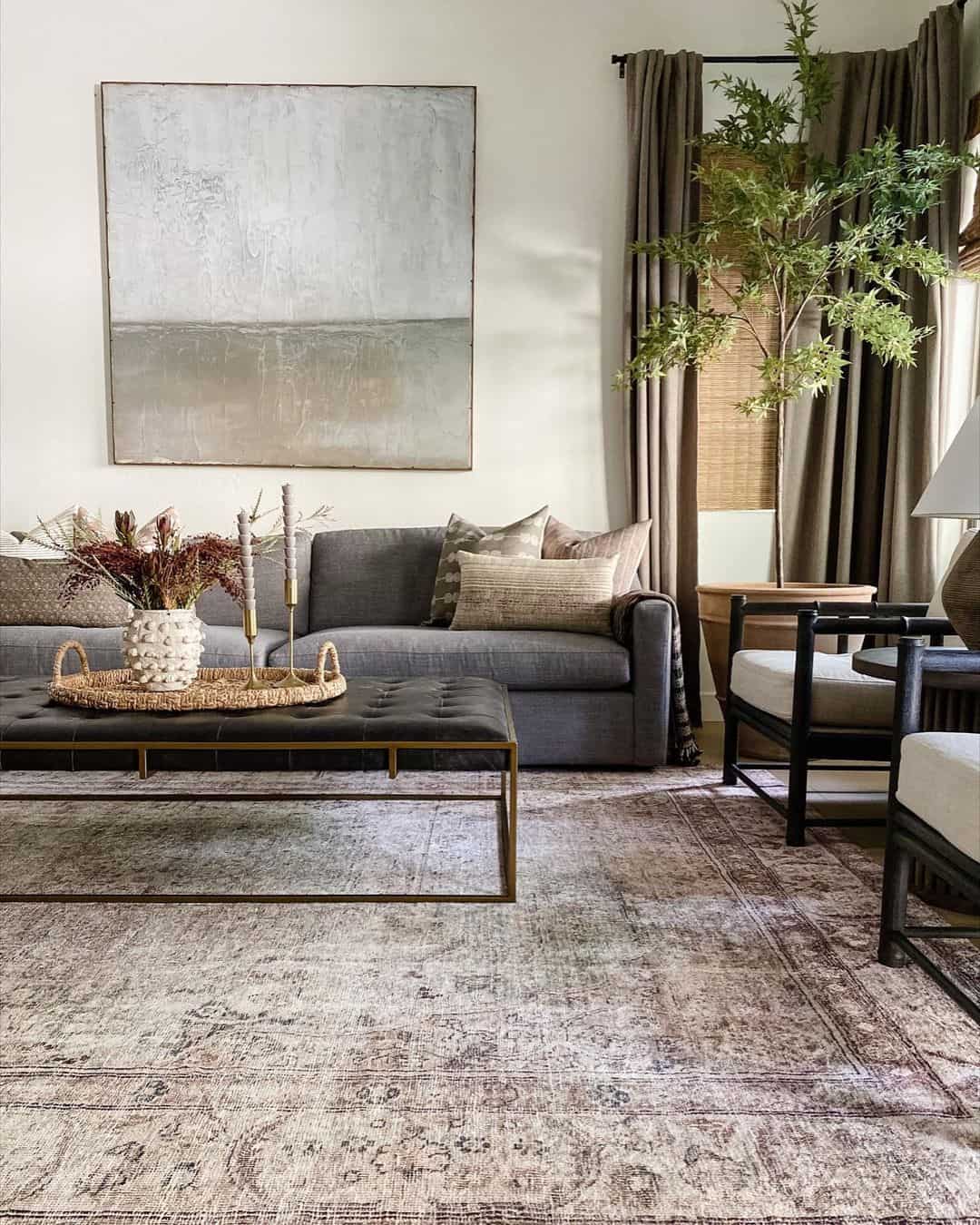 Large Abstract Art Piece Anchors The Dark Grey Sofa