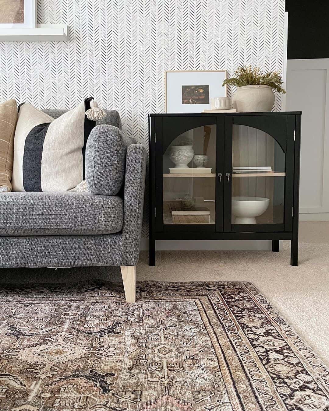 Black Glass-Door Cabinet Adds Curated Display Space