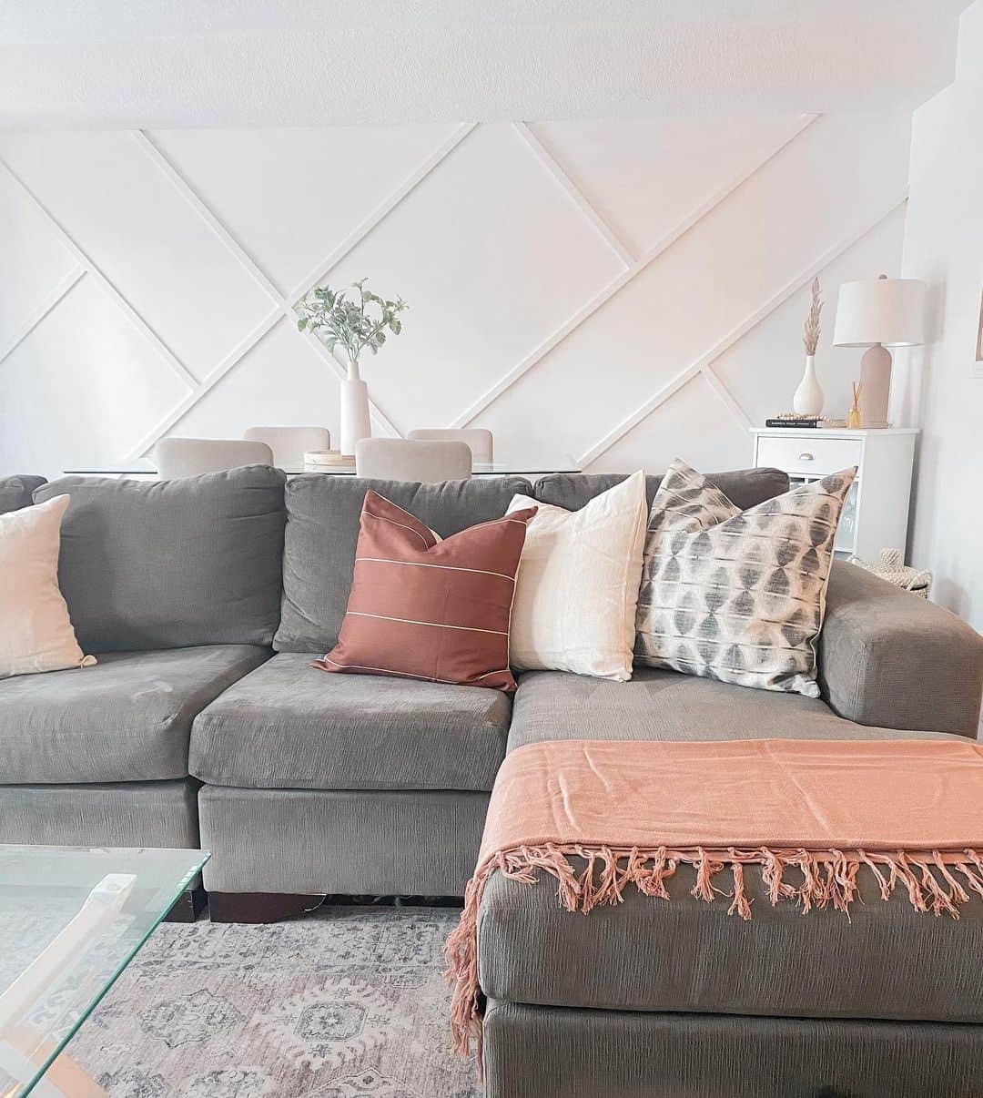 Geometric Wall Paneling Adds Architectural Interest Behind Your Sofa