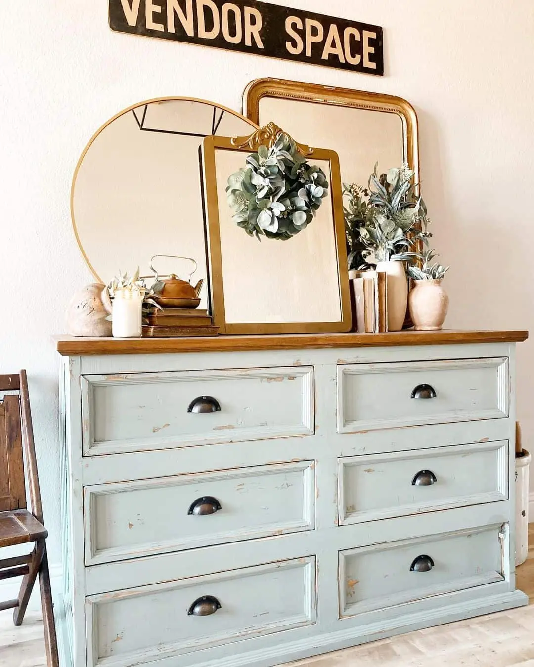 Layered Mirrors Create Depth Above the Dresser