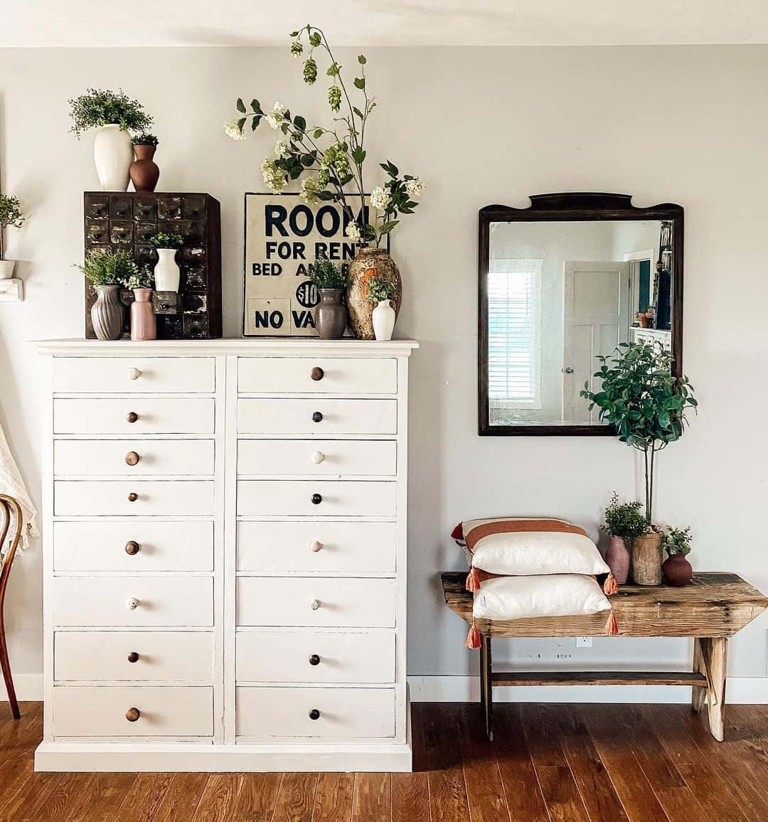 Vintage Sign and Tall Vase for a Quirky Touch
