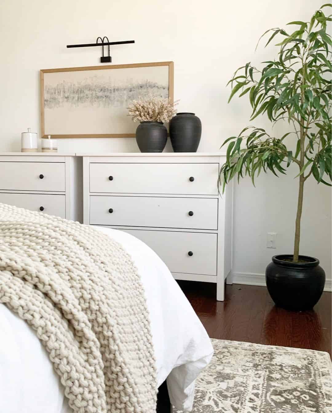 Juxtaposed Black Vases Add Dramatic Contrast