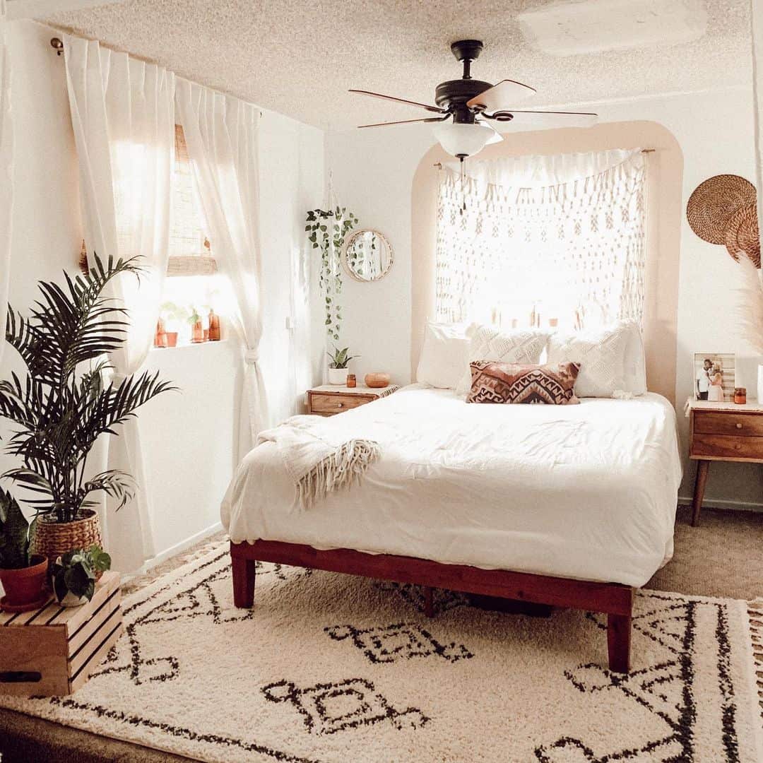 Layer Bedding with Textured Throw Pillows and a Fringed Blanket