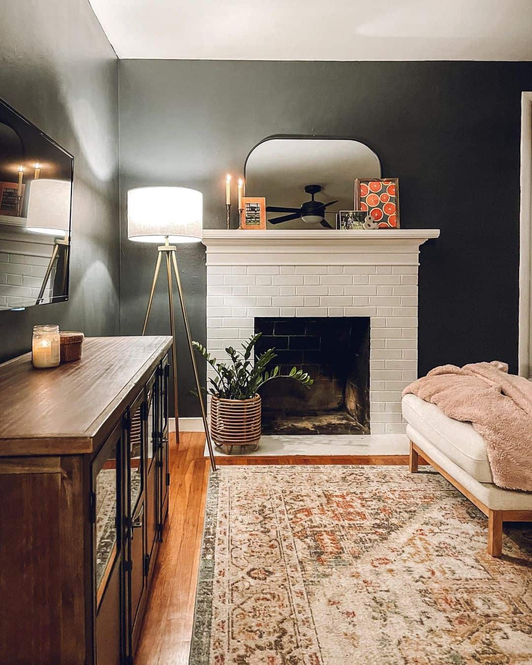 Frame Your Mantel Decor With an Arched Mirror