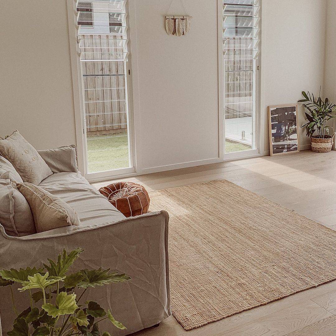Ground Your Seating Area With a Woven Jute Rug