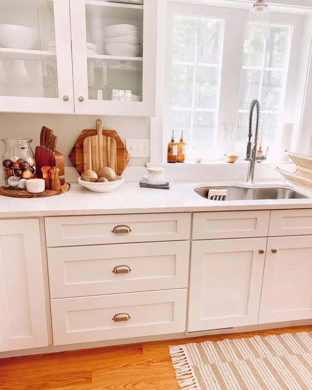 Wooden Cutting Boards Stacked Against Backsplash