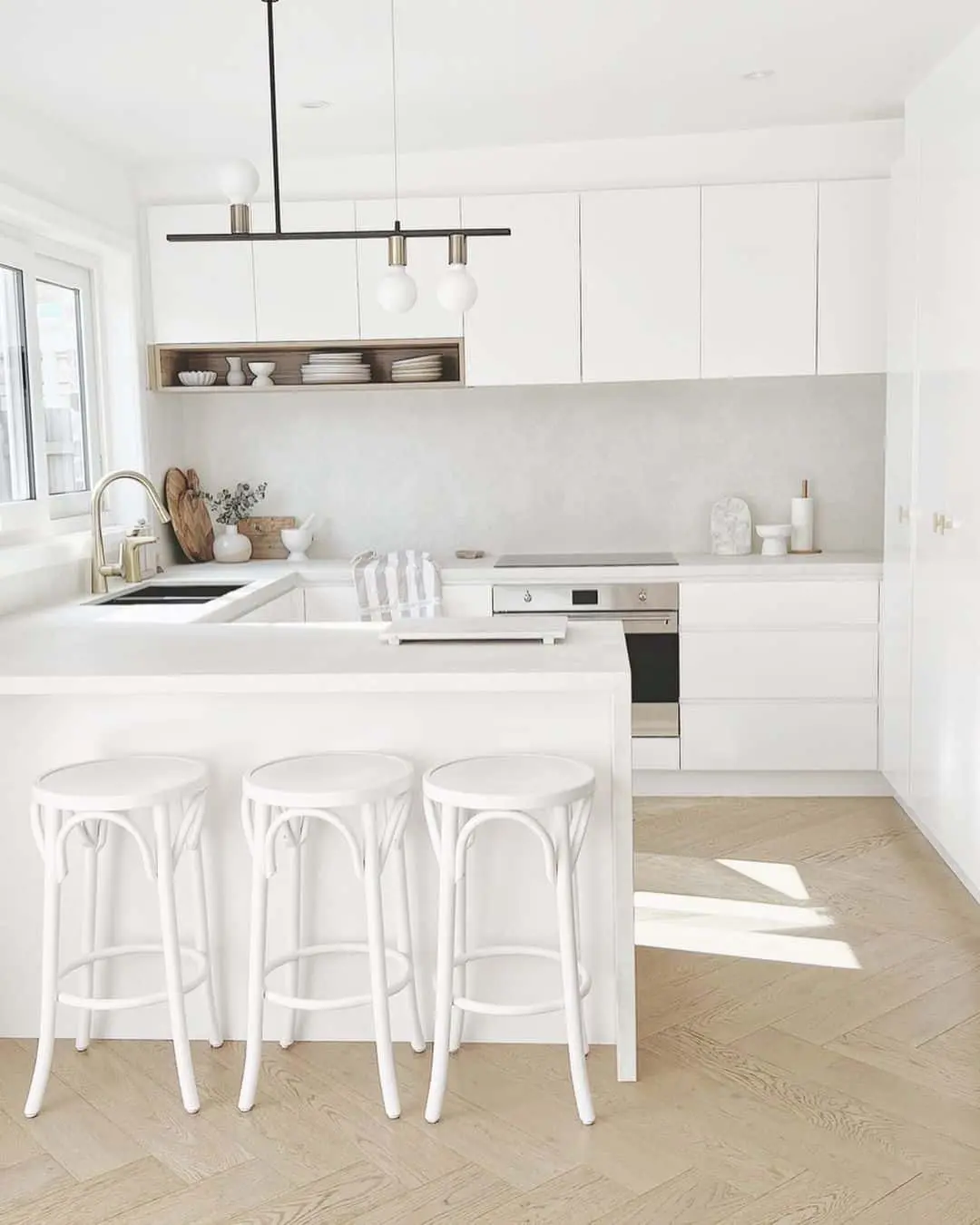 Soften Your Island with Curved White Stools