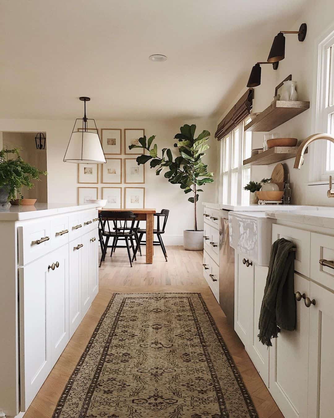 Gallery Wall Adds Artful Charm Above Dining Area