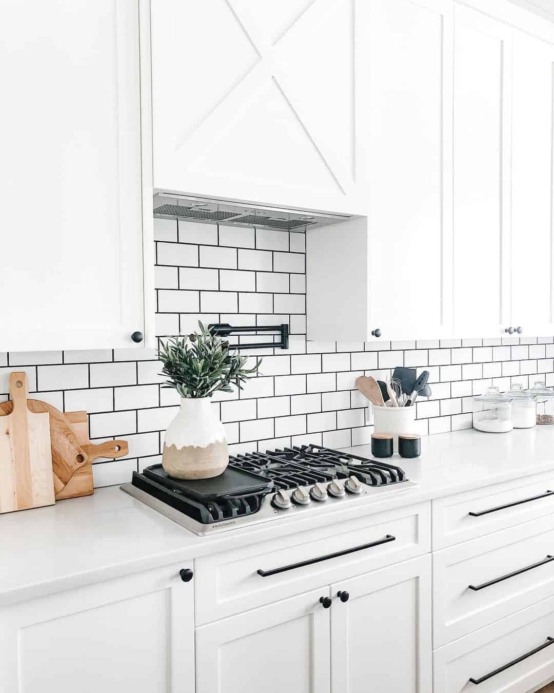 Two-Tone Ceramic Vase Holds Fresh Greenery on Stove