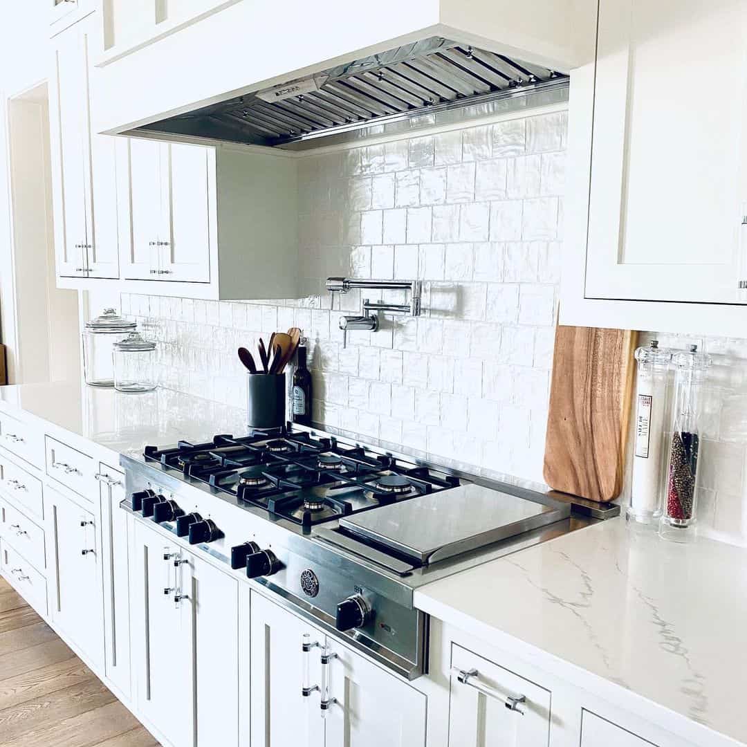 Pot Filler Faucet Over Square White Tile Backsplash