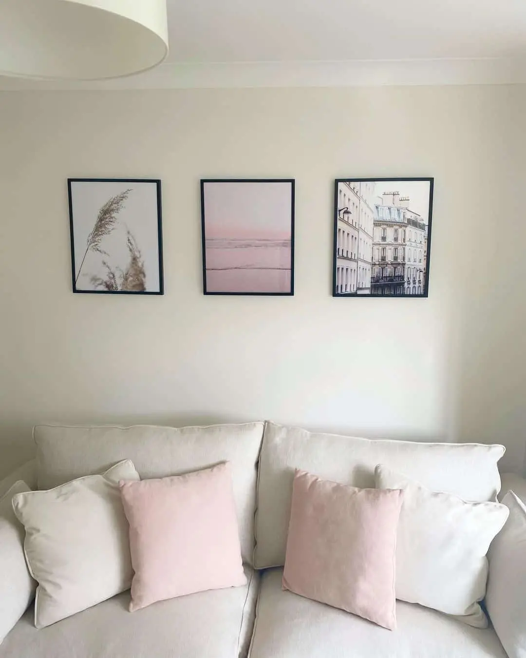 Layer Soft Pink and Cream Pillows for a Cozy Sofa