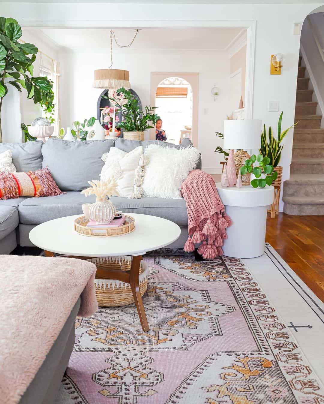 Pink Tassel Throw Adds Cozy Texture to Sofa